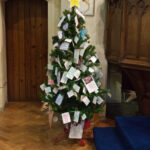 Christmas tree with lights in a garden