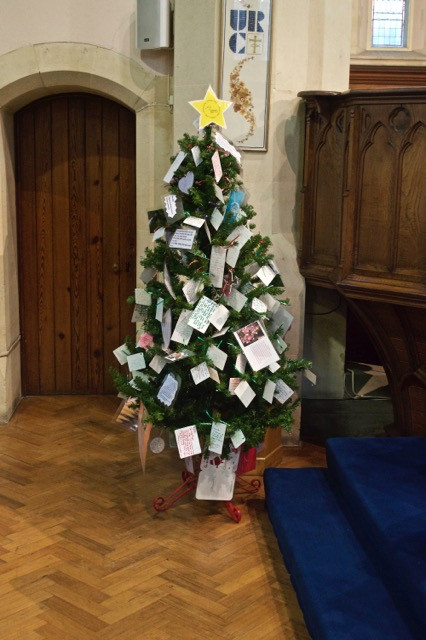 Christmas tree with lights in a garden