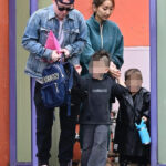 Macaulay Culkin and Brenda Song spotted in Los Angeles with their children, showcasing their hands-on parenting style