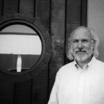 John Fischbach at the mixing console, highlighting his expertise as a world-class producer and engineer.