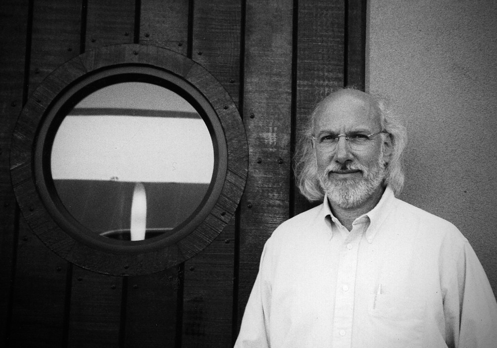 John Fischbach at the mixing console, highlighting his expertise as a world-class producer and engineer.