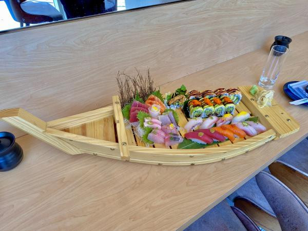 Exquisite sushi boat at Song Lan restaurant in Dublin Ohio showcasing a variety of fresh sushi and sashimi rolls.