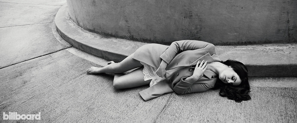 Lana Del Rey in a retro-style image, possibly a promotional shot for &quot;Freak&quot;, embodying a vintage aesthetic and allure.