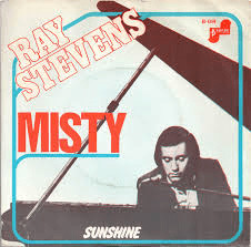 Ray Stevens performing on stage