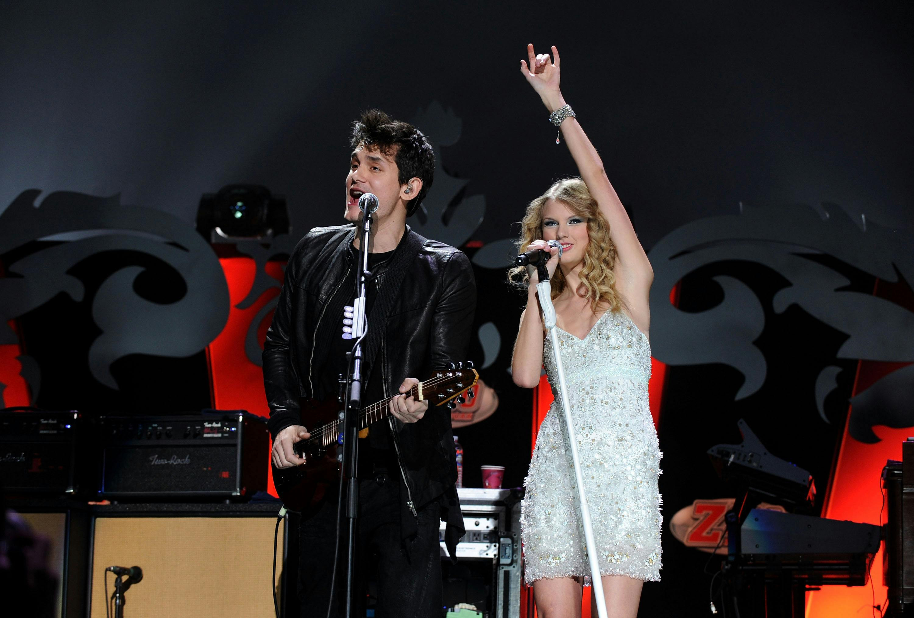 Taylor Swift and John Mayer performing at the Jingle Bell Ball in 2009